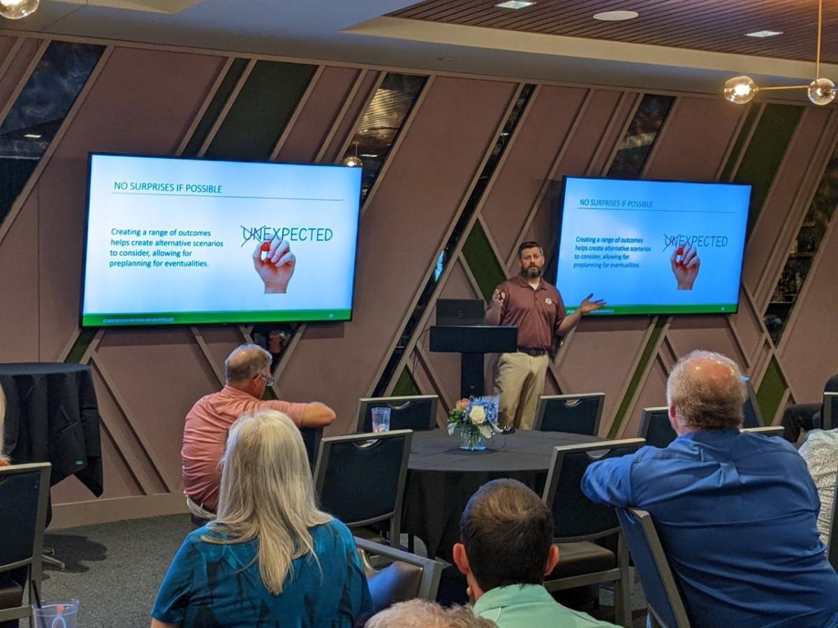 NewGen team presenting at an industry conference